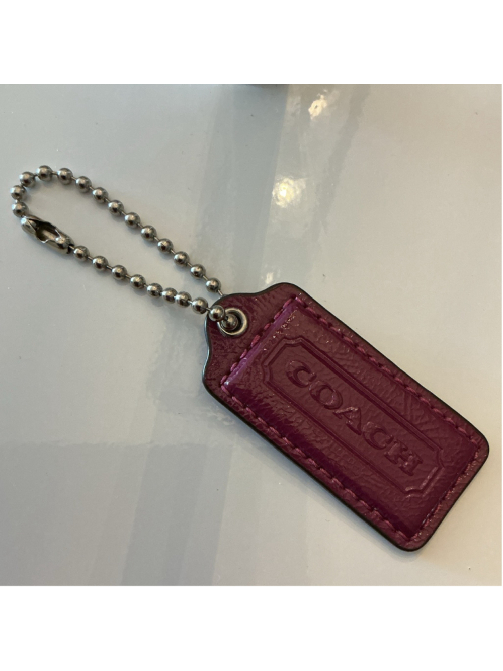Coach Plum Bag Tag